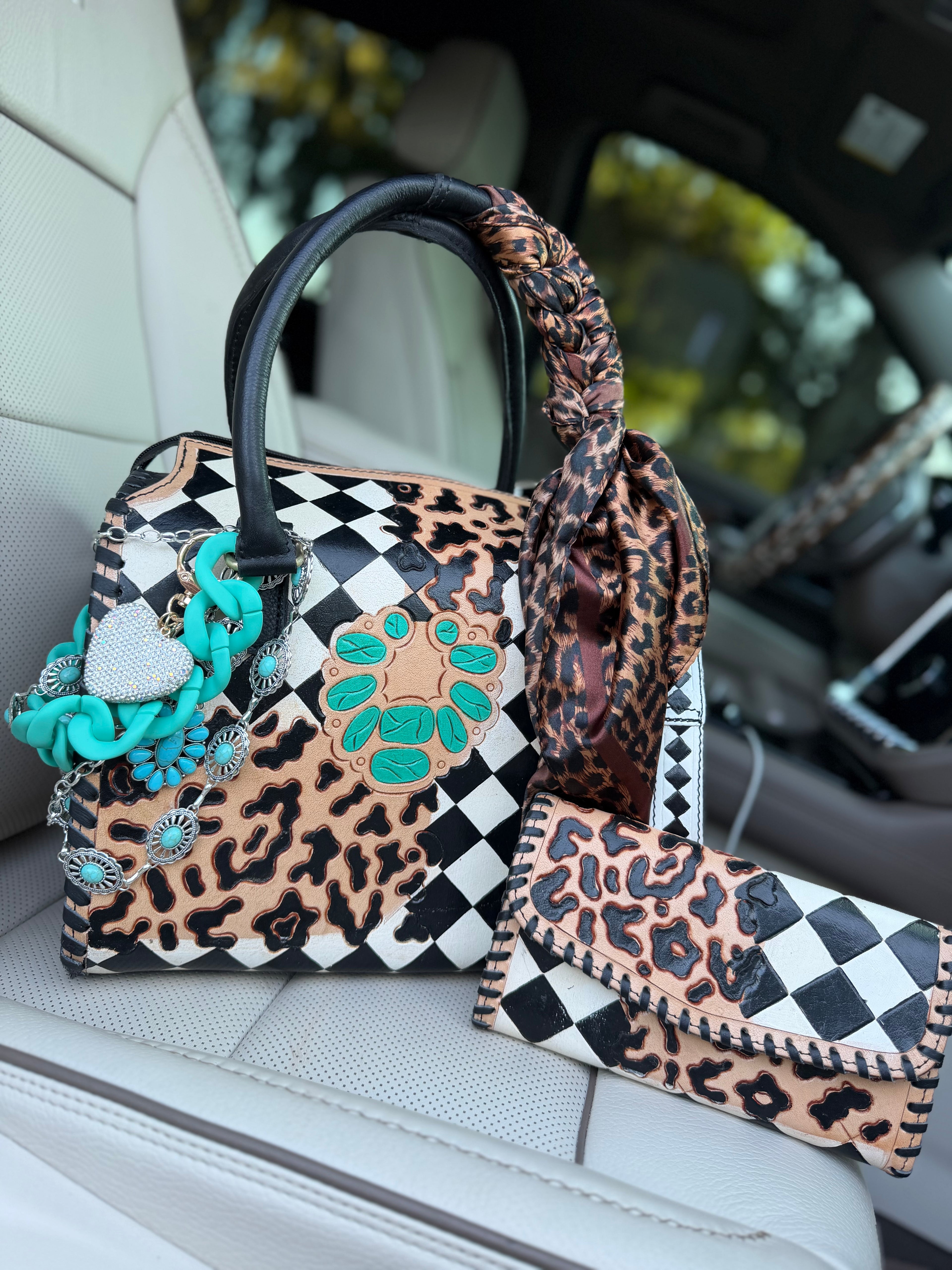 “Outlaw Belle”black/white checker and cheetah tooled leather speedy (L) by the Painted Porches