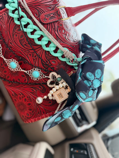 “Ruby Ranch Royalty” tooled leather speedy (L)