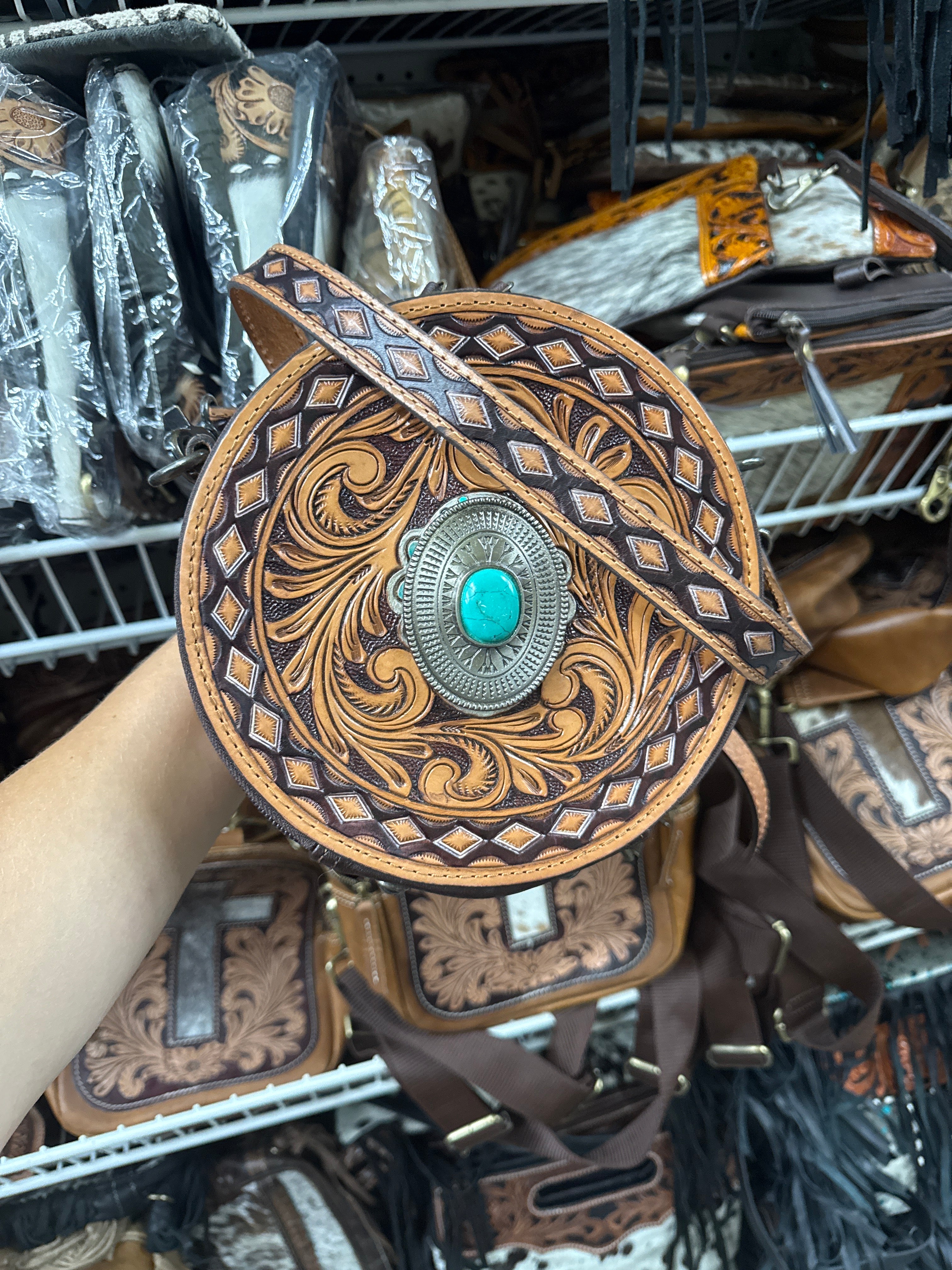 Brown tooled canteen purse with turquoise