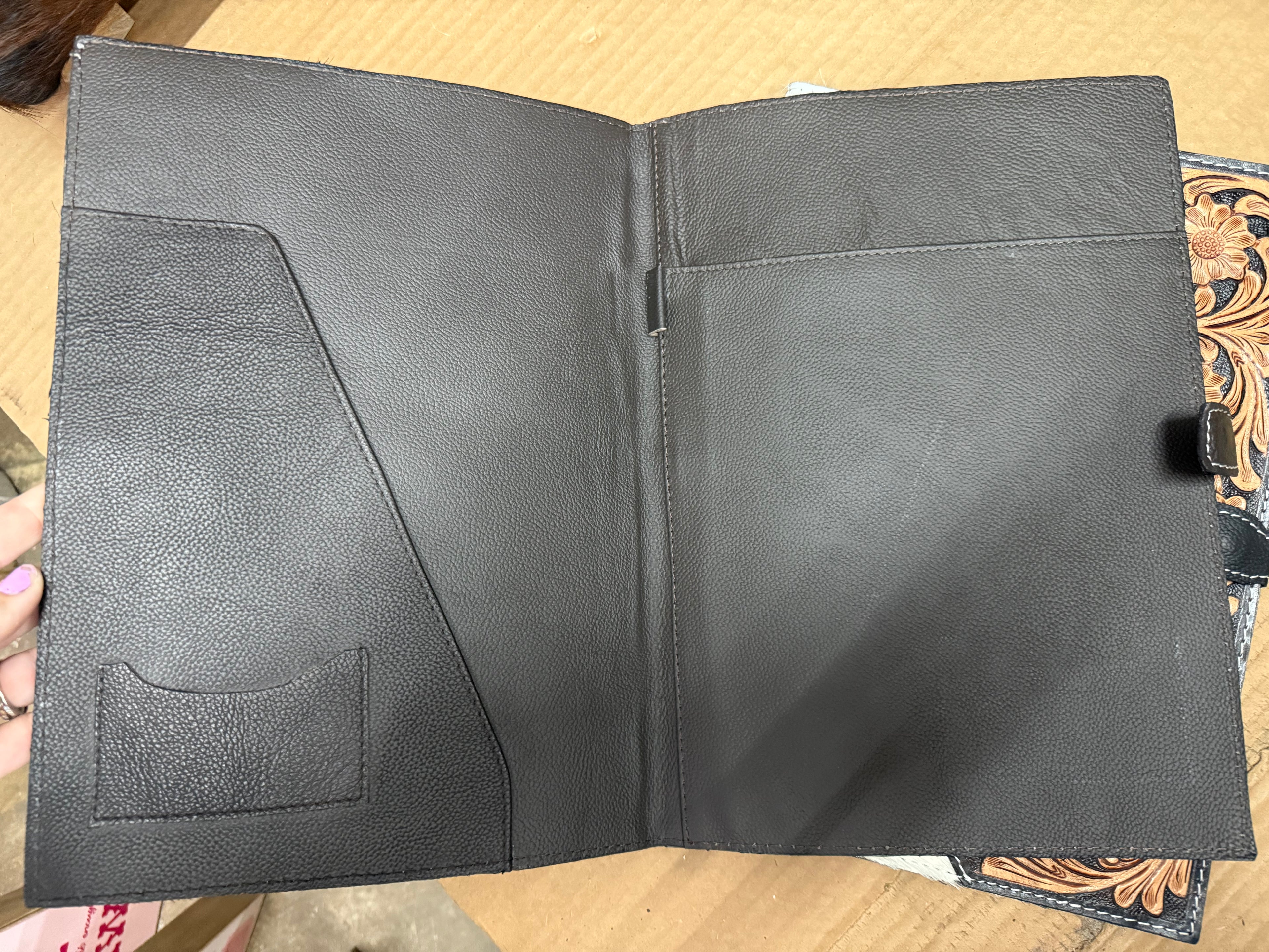 Cowhide and tooled leather notebook portfolio cover