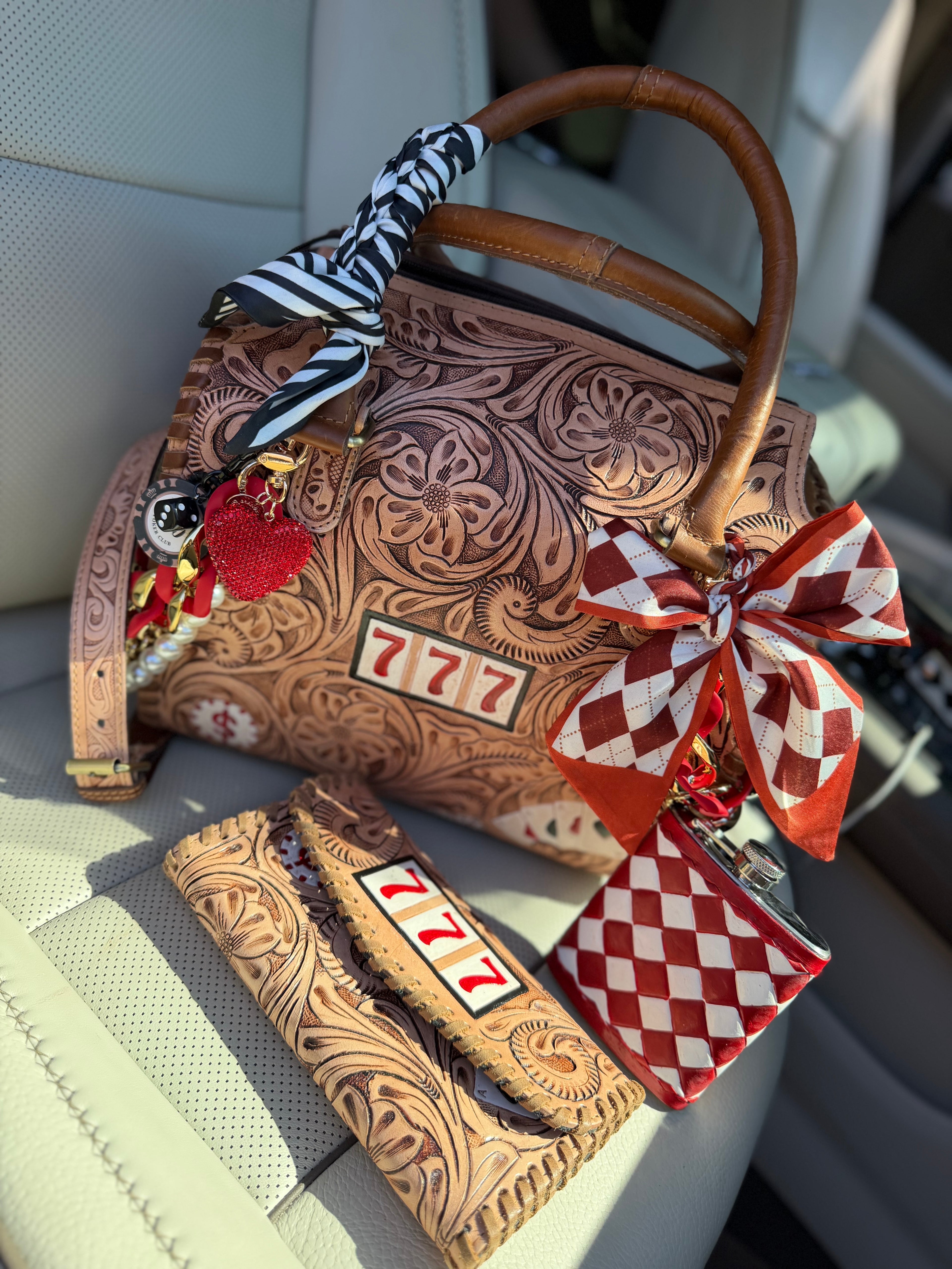“ Lucky 7s” Brown tooled leather speedy (L) by the Painted Porches