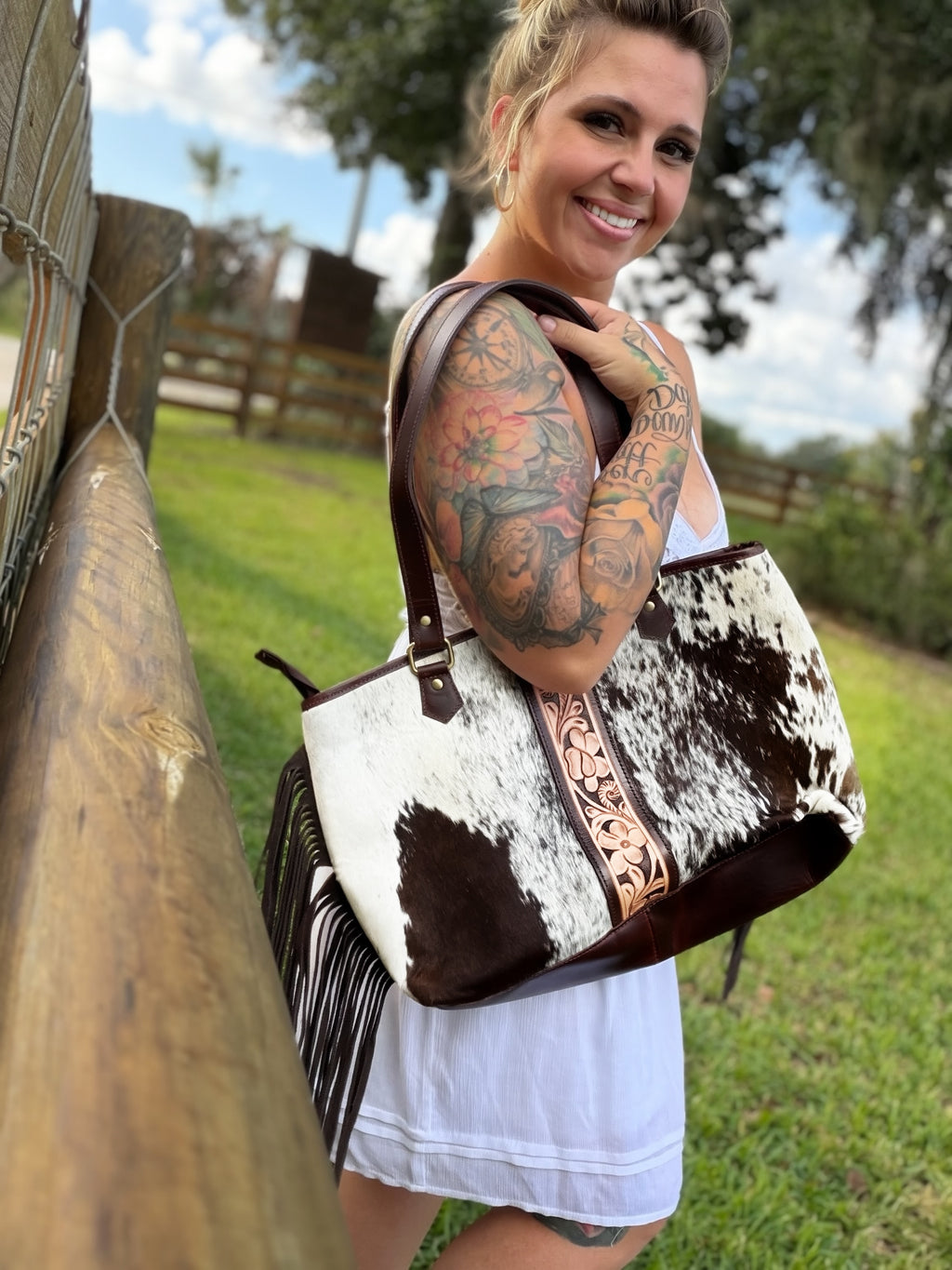 Fringe cowhide purse