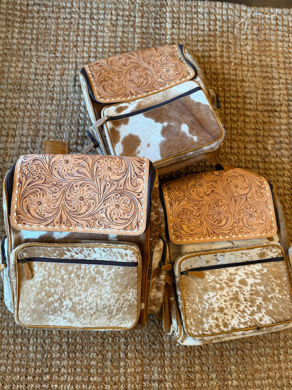 Cowhide tooled leather bookbag