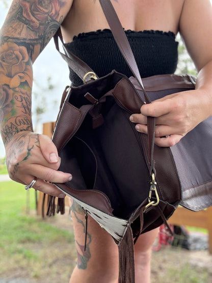 Tooled leather and cowhide purse