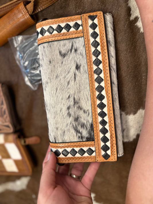 Checker wallet has strap for clutch