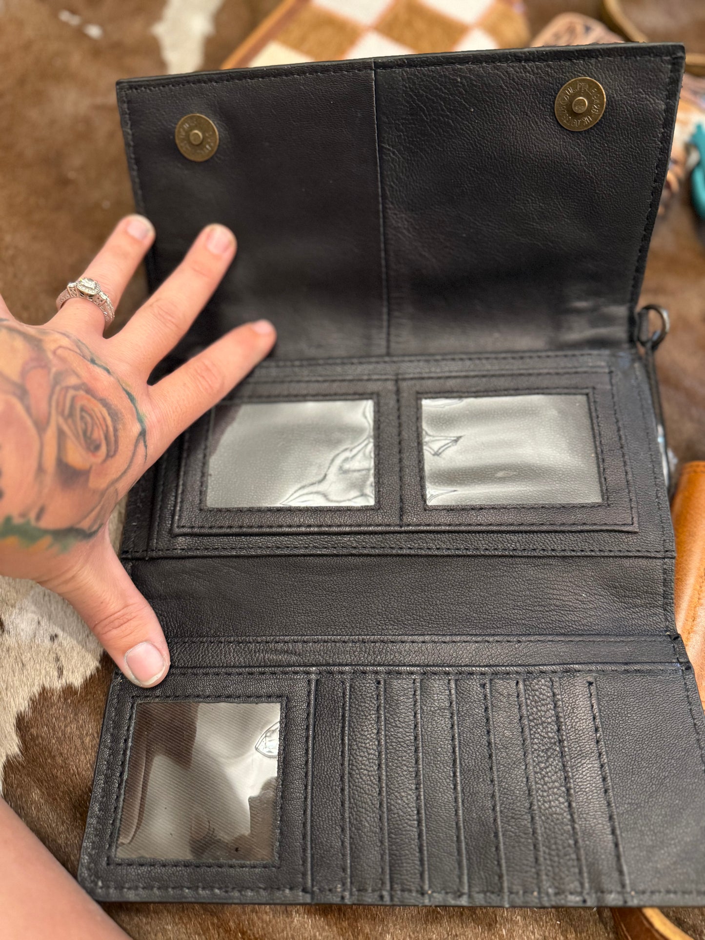 Checker wallet has strap for clutch
