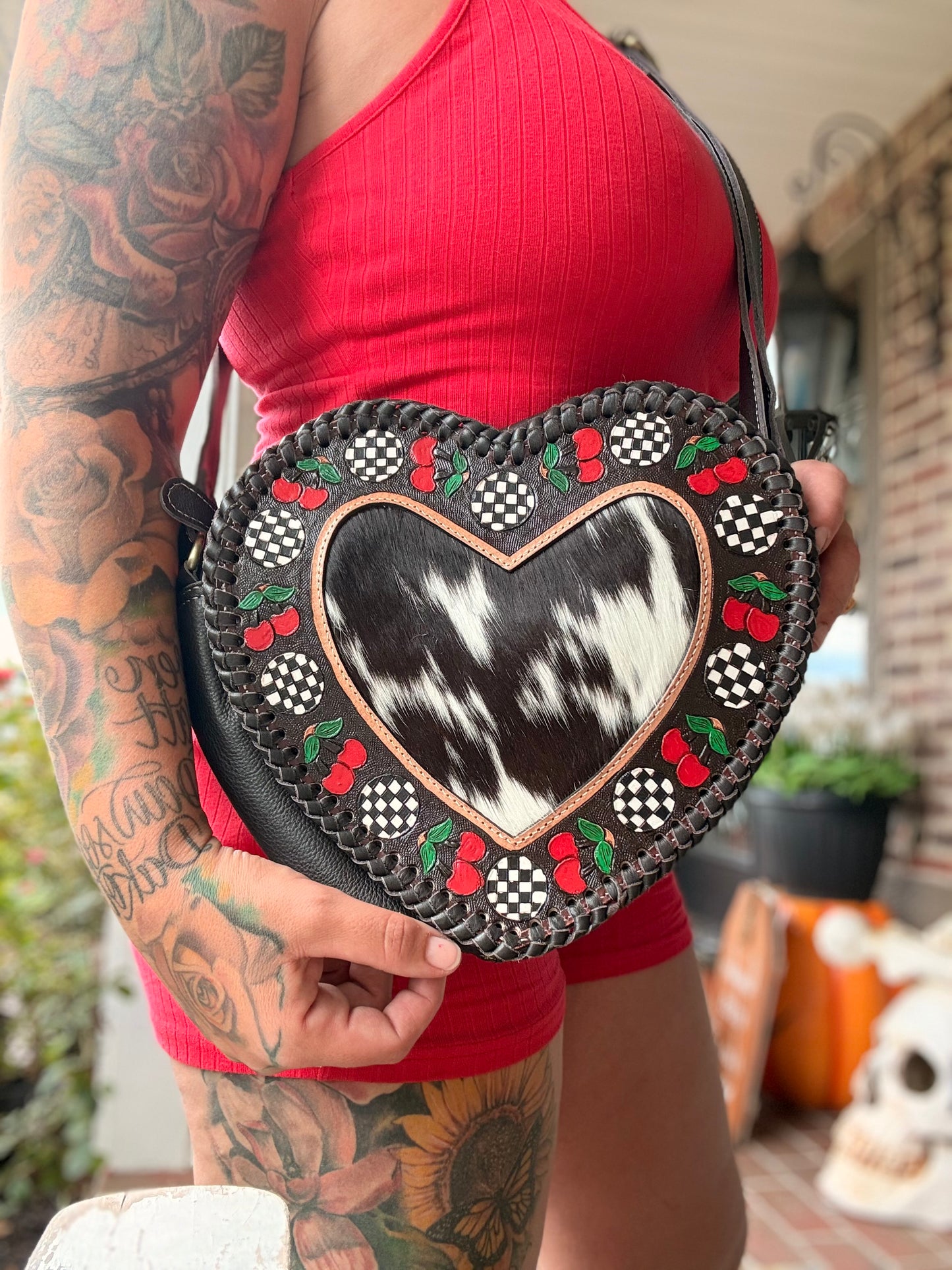 Checker heart canteen with cherries