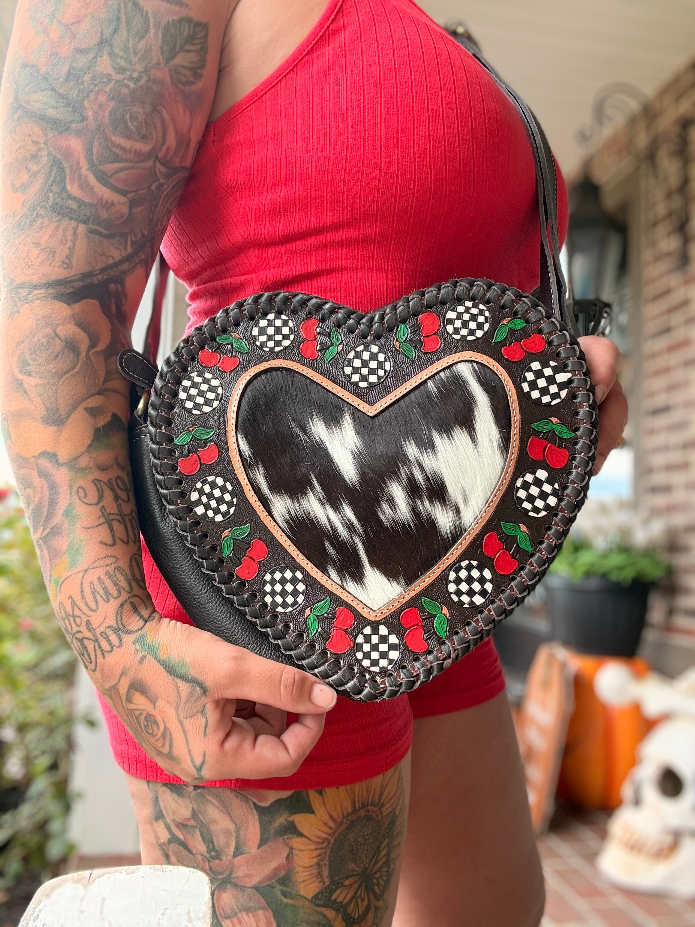 Checker heart canteen with cherries