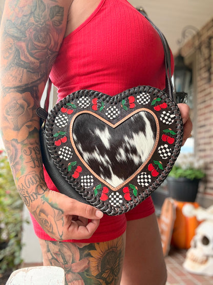 Checker heart canteen with cherries