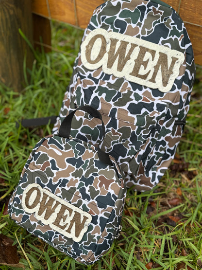 Cowhide bookbag with cowhide name patch only