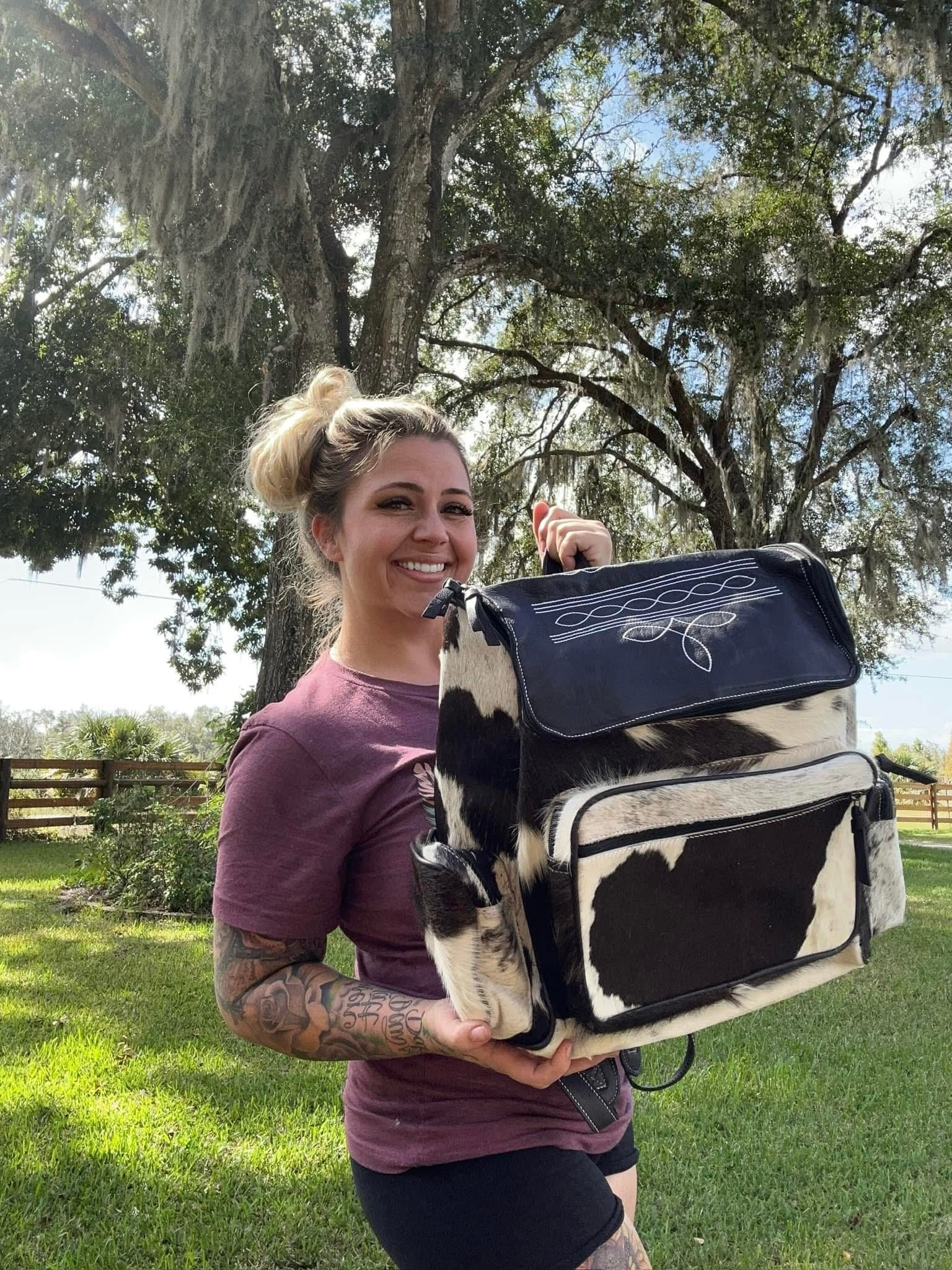 Cowhide boot stitch Bookbag