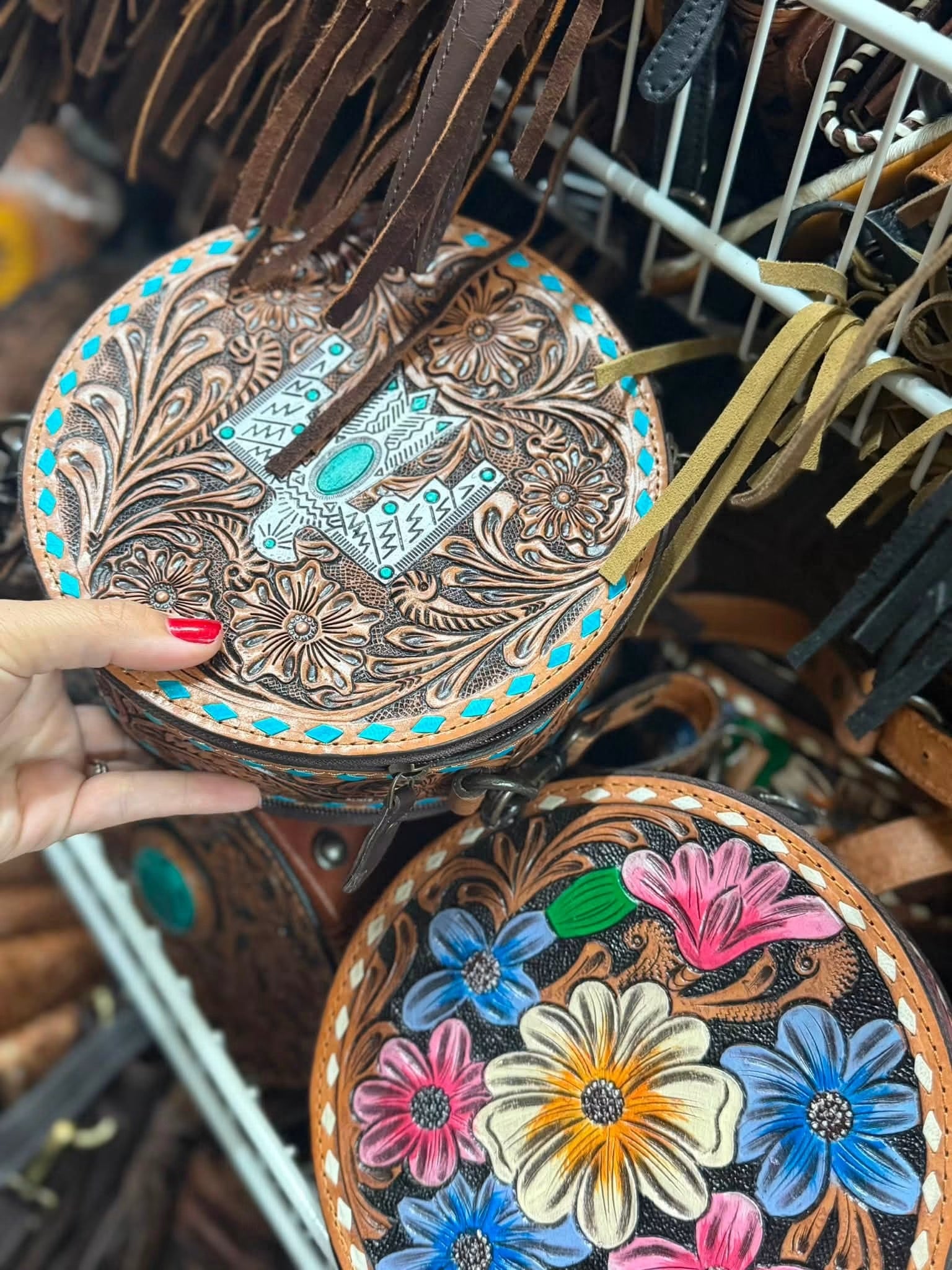 Tooled thunderbird leather canteen purse
