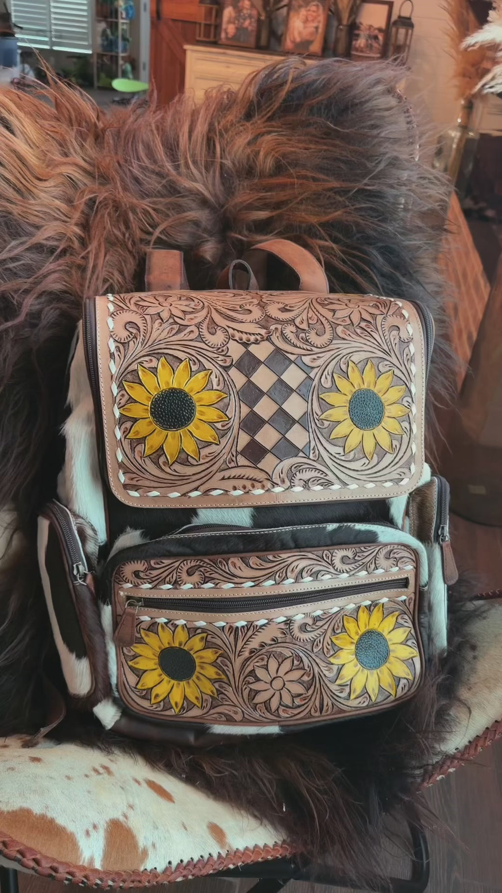 Tooled leather bookbag