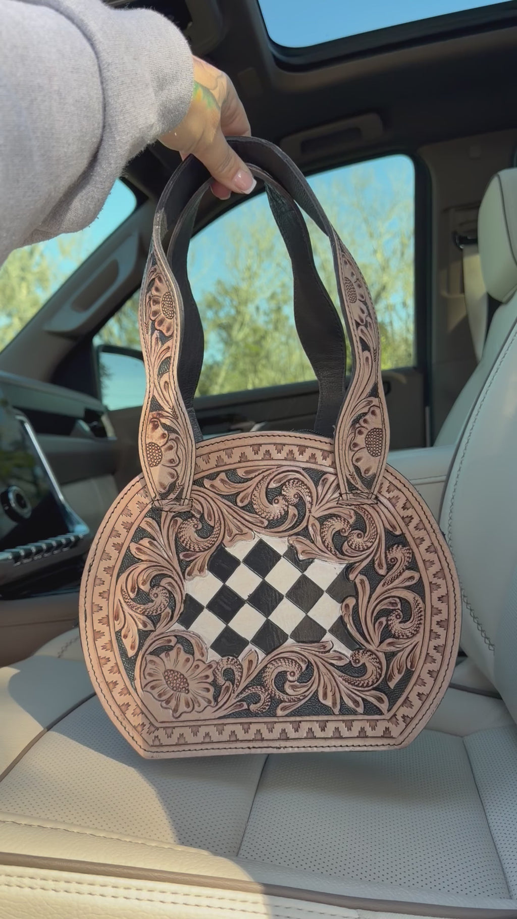 Tooled leather checker purse