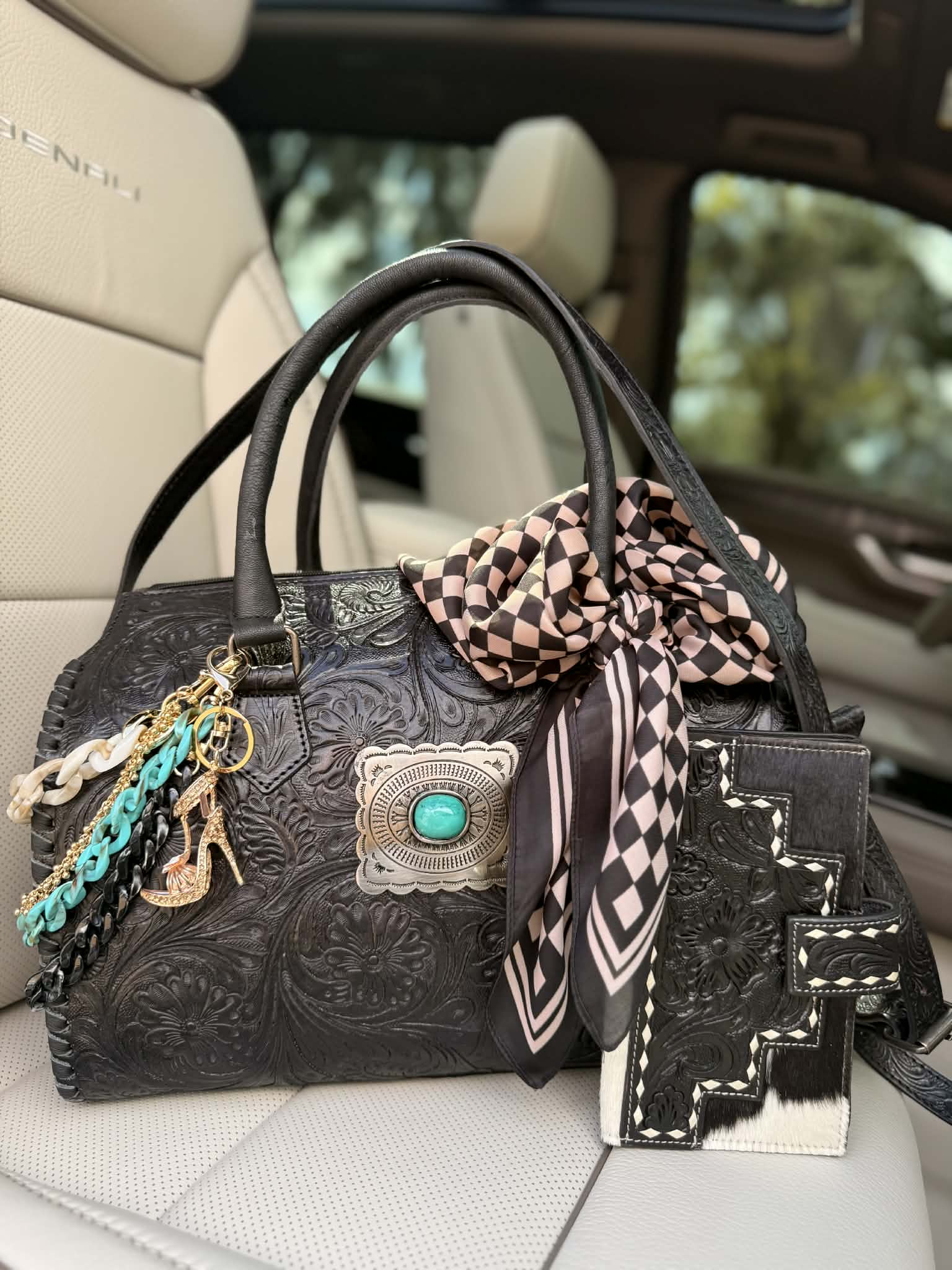 "Turquoise after Dark" - black tooled leather speedy duffle