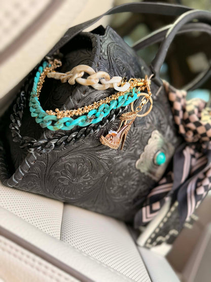 "Turquoise after Dark" - black tooled leather speedy duffle