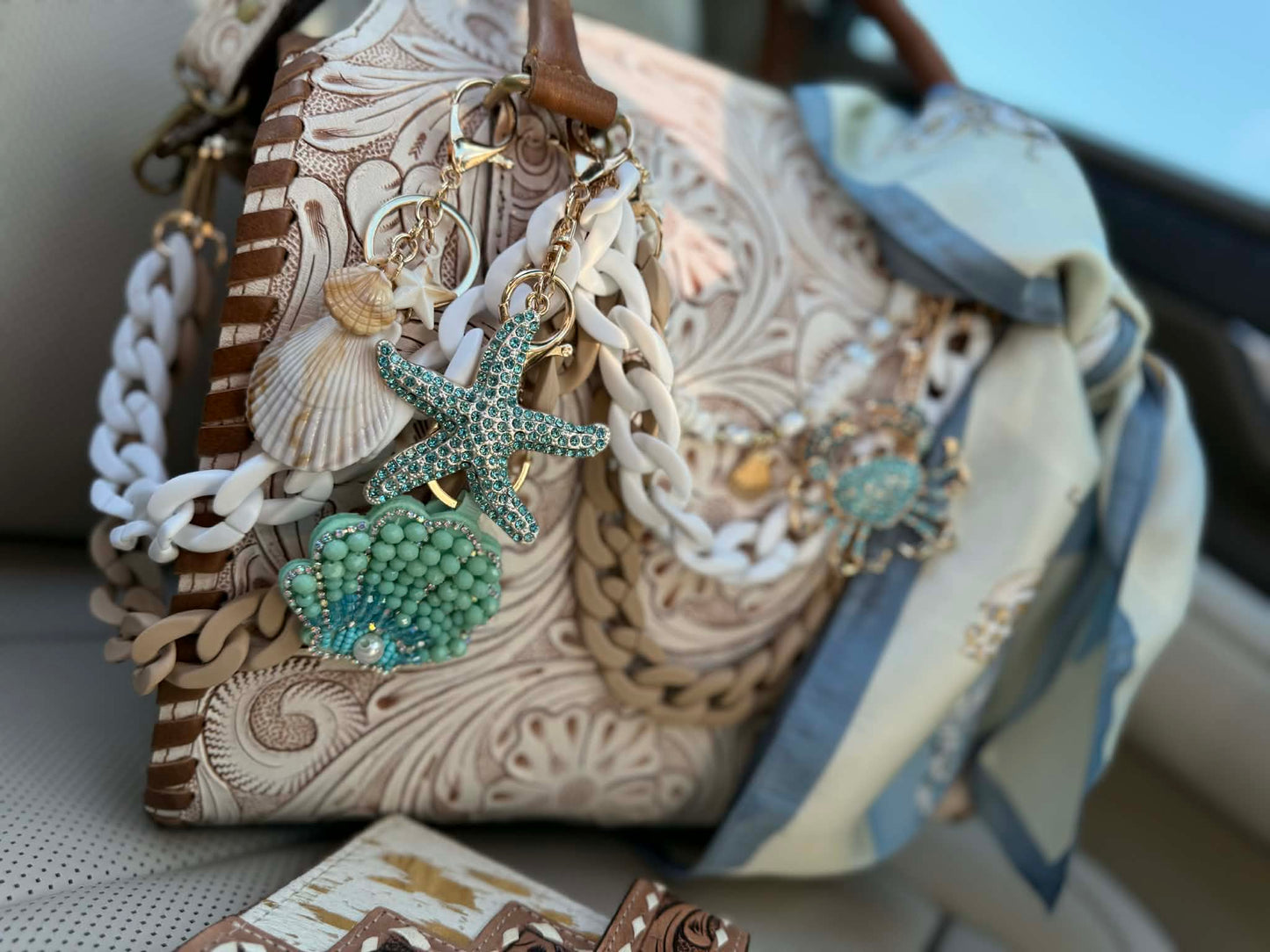 "Serenity by the Sea" - white tooled leather speedy (L)