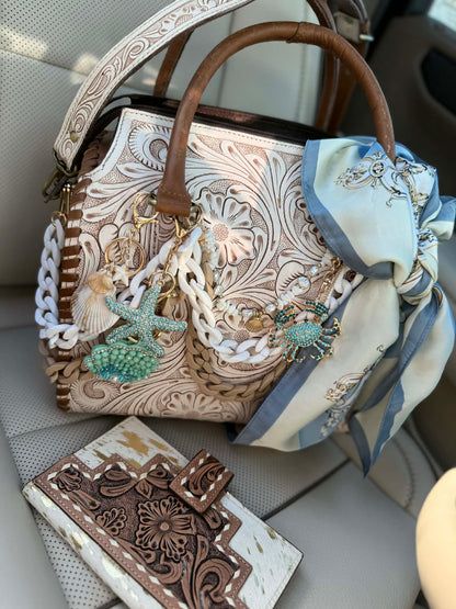 "Serenity by the Sea" - white tooled leather speedy (L)